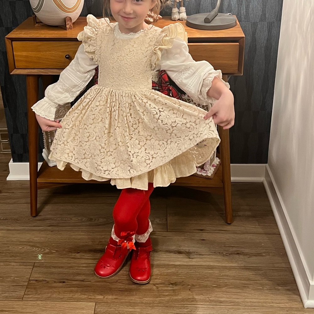 Two Roosters Clothing Cream Lace Kids Dress with Red tartan bows and shorts